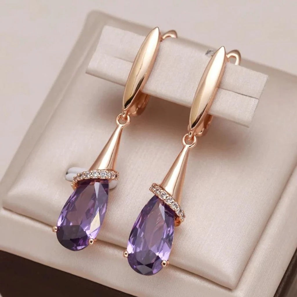 Boucles d'oreilles en or et zircone violette