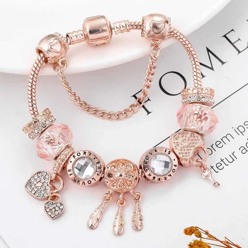 Bracelet attrape-rêves rose avec breloques incluses en argent sterling