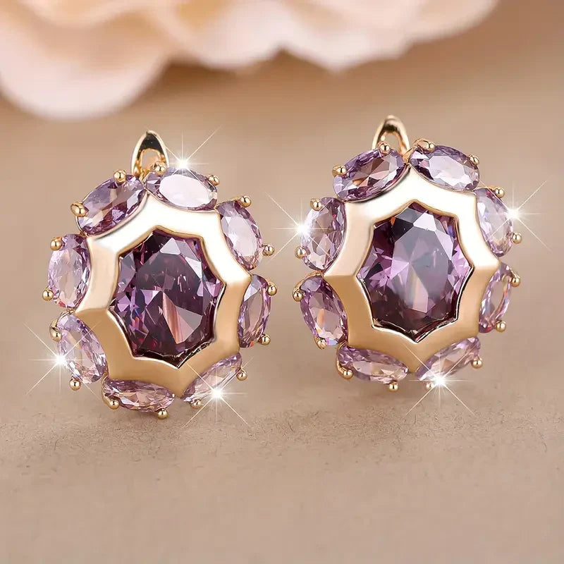 Boucles d'oreilles rondes en or et zircone violette