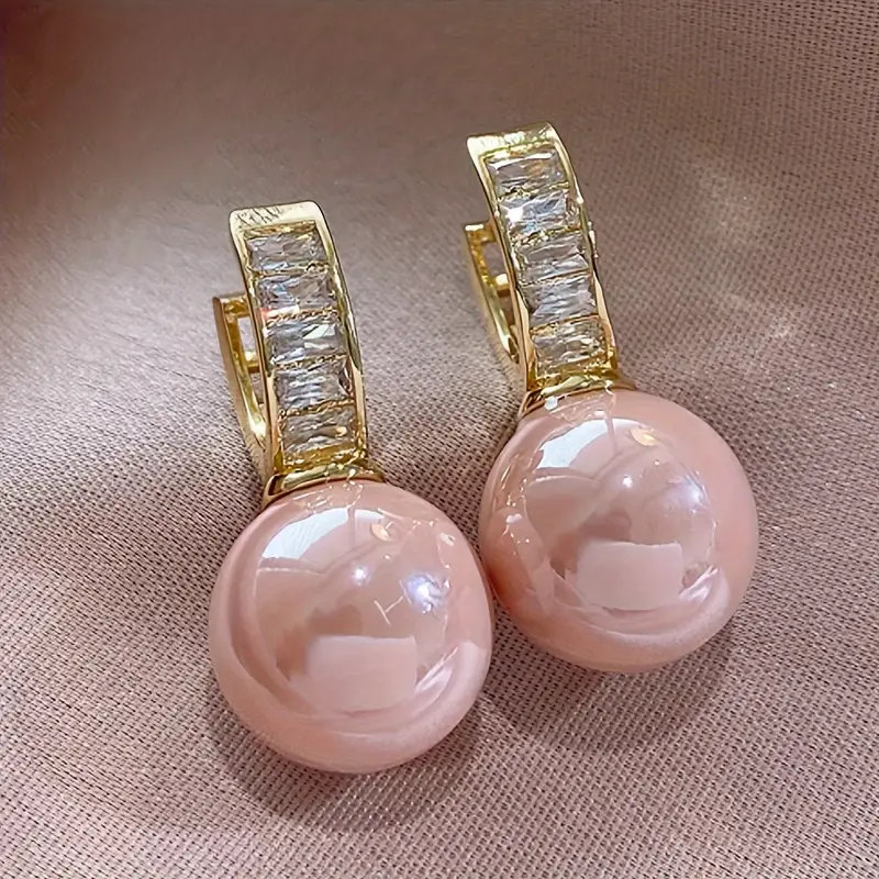 Boucles d'oreilles en or et zircone rose